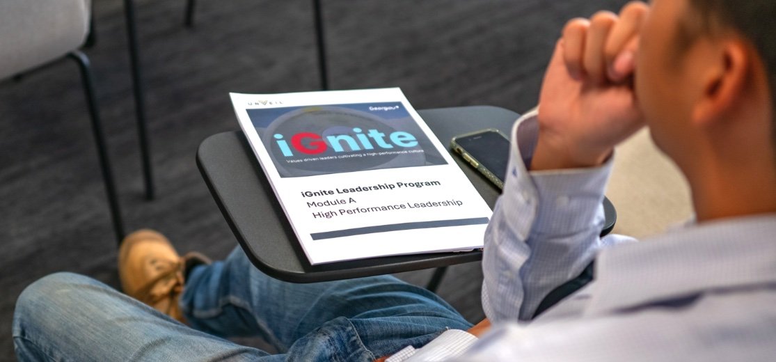A participant with the iGnite Module A leadership workbook