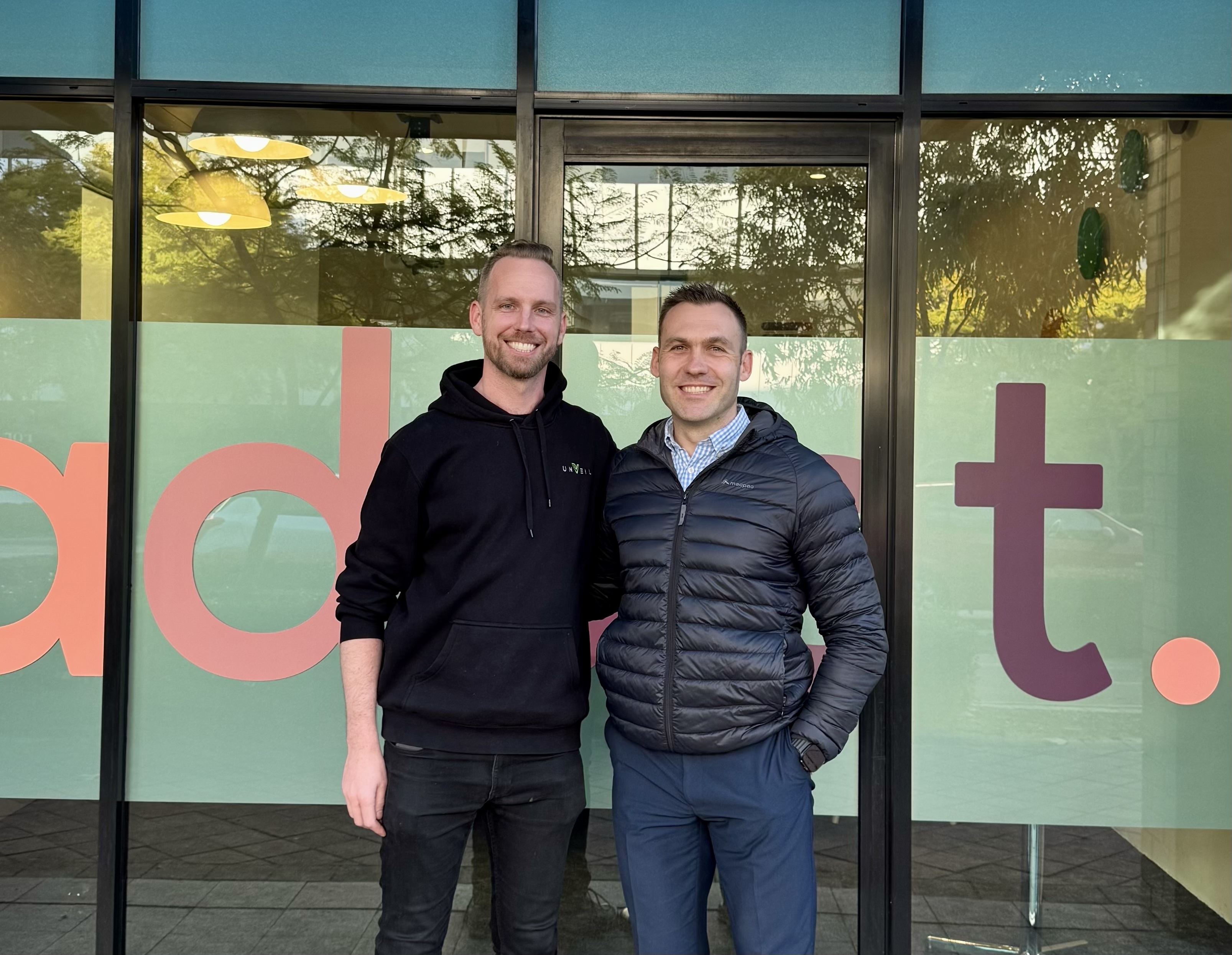 Mitch Catterall with Gabe from Adapt outside the Adapt office